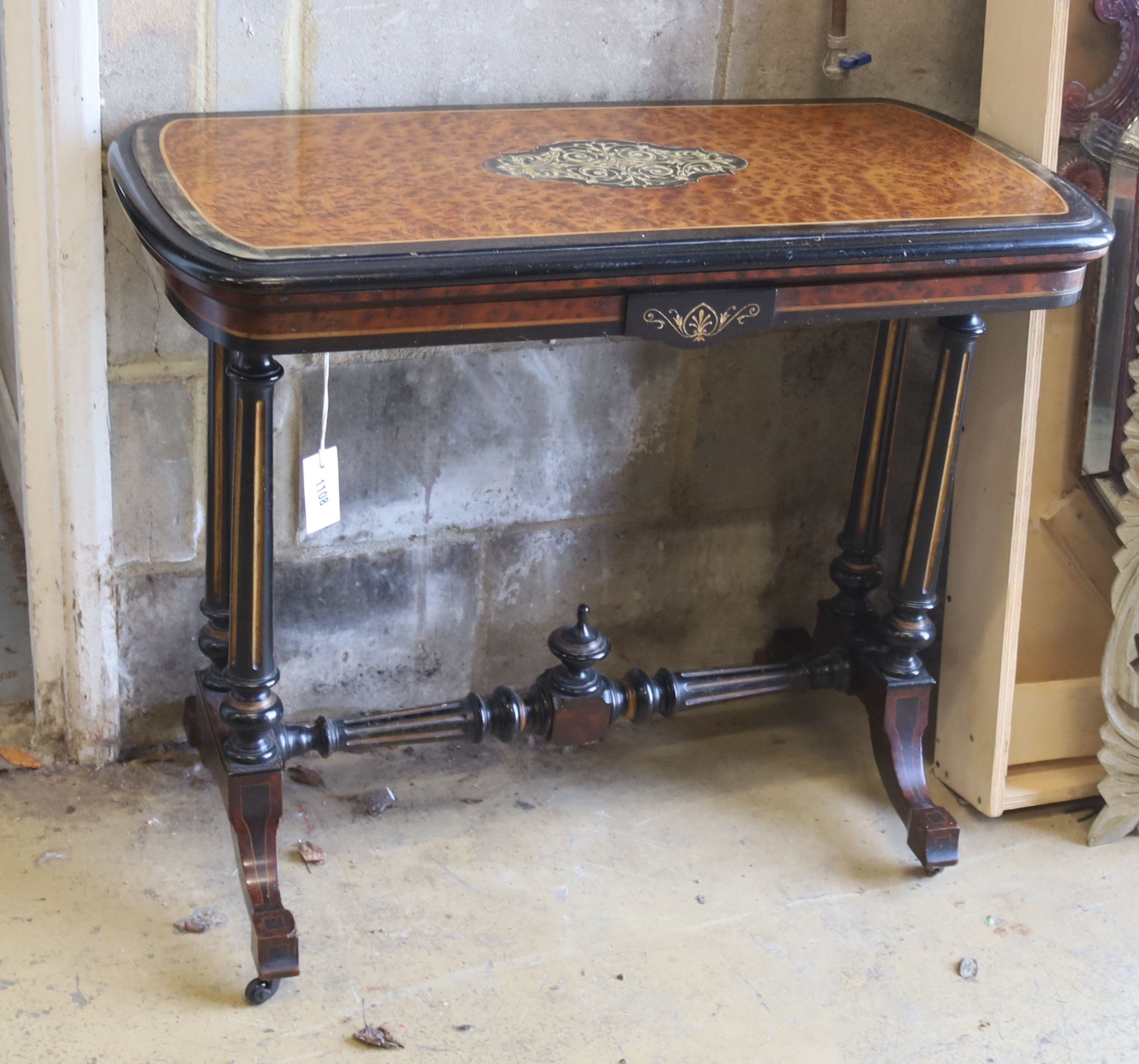 A Victorian inlaid part embonised Amboyna rectangular folding card table, width 90cm, depth 45cm, height 74cm